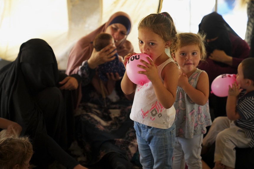 Children pictured in a tent in the al-Hawl camp in Syria.