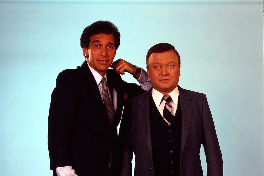 Don Lane stands next to Bert Newton for a 1980s commercial.