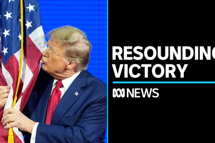Resounding Victory: Donald Trump kisses an American flag