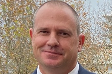 A man in a suit from the Environmental Protection Authority.