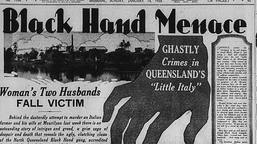 An old black and white newspaper with 'black hand menace' as the headline with a black hand on the page