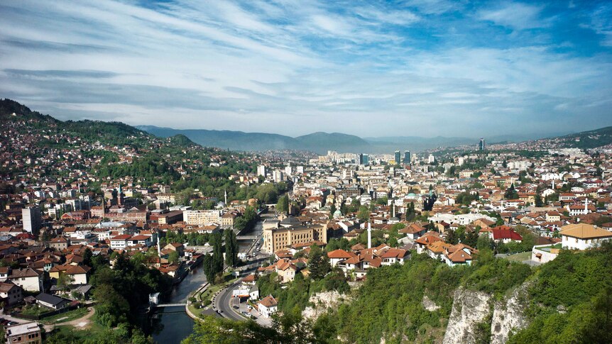 View of red-roofed Sarajevo from  surrounding hills in 2016.