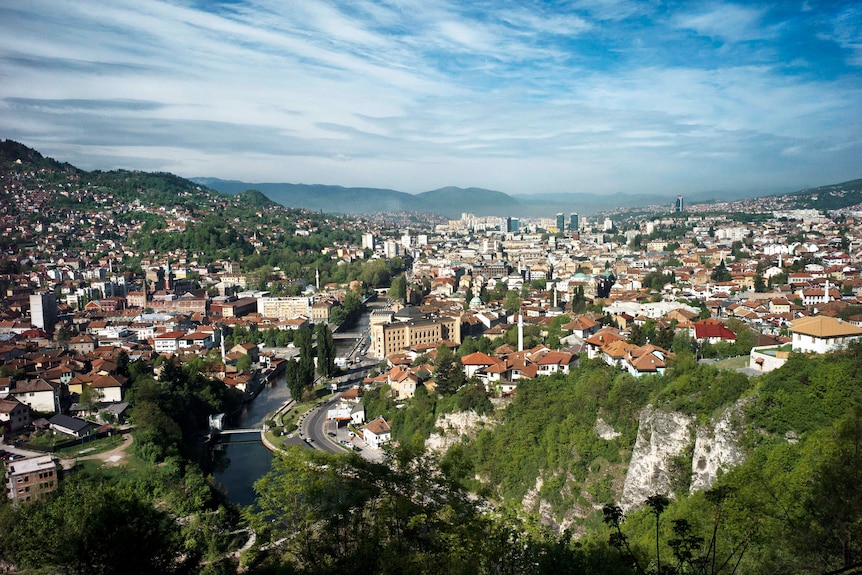 View of red-roofed Sarajevo from  surrounding hills in 2016.