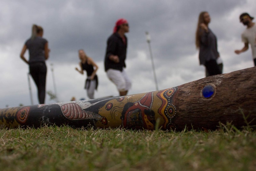 Jannawi dance clan didgeridoo rests on the grass at Barangaroo during rehearsals for Australia Day