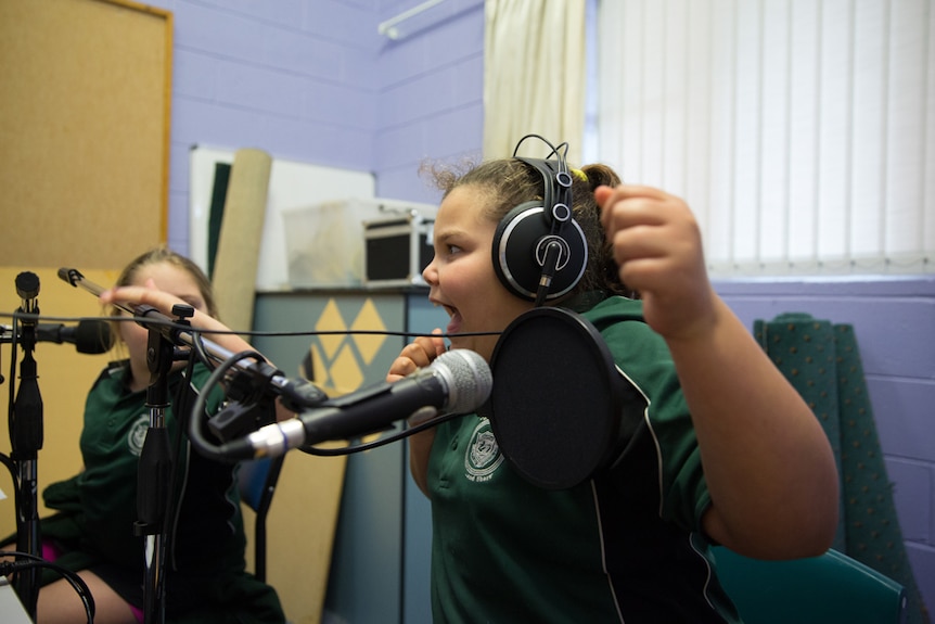 Smithton student Sarah Martorella wears headphones