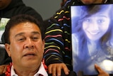 In mourning: Jeremiah Lale (left) and his nephew at a press conference on Friday