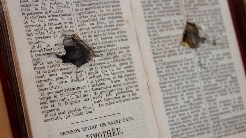 The Bible owned by Lieutenant Elvas Jenkins and still holds the bullet that was shot at him