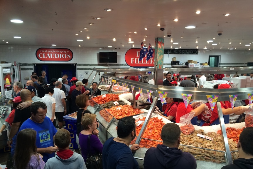 Crowds gather at Sydney Fish Market on Good Friday