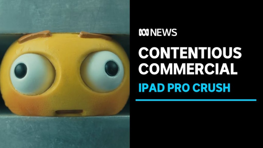 Contentious Commercial, iPad Pro Crush: A still from an advertisement of an emoji being crushed from the top and bottom.
