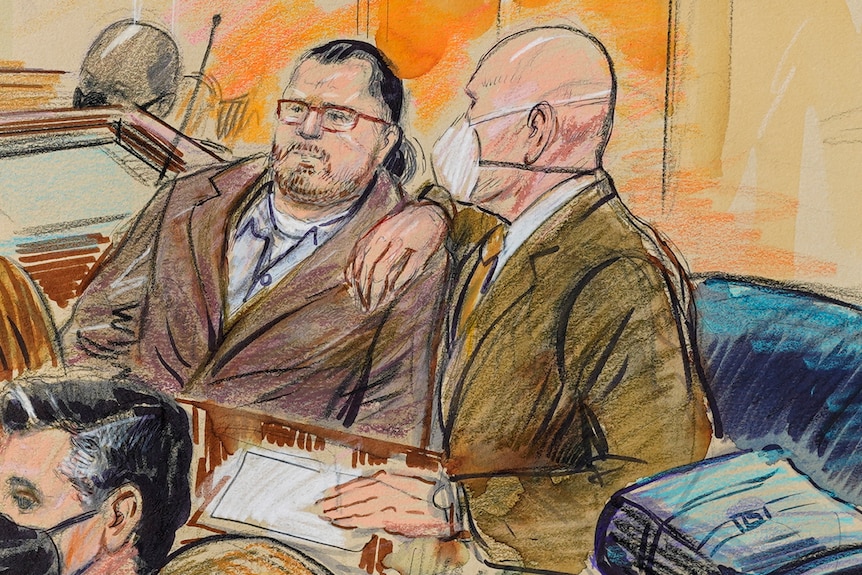  Artist sketch of Guy Wesley Reffit and his lawyer talking to him in court.