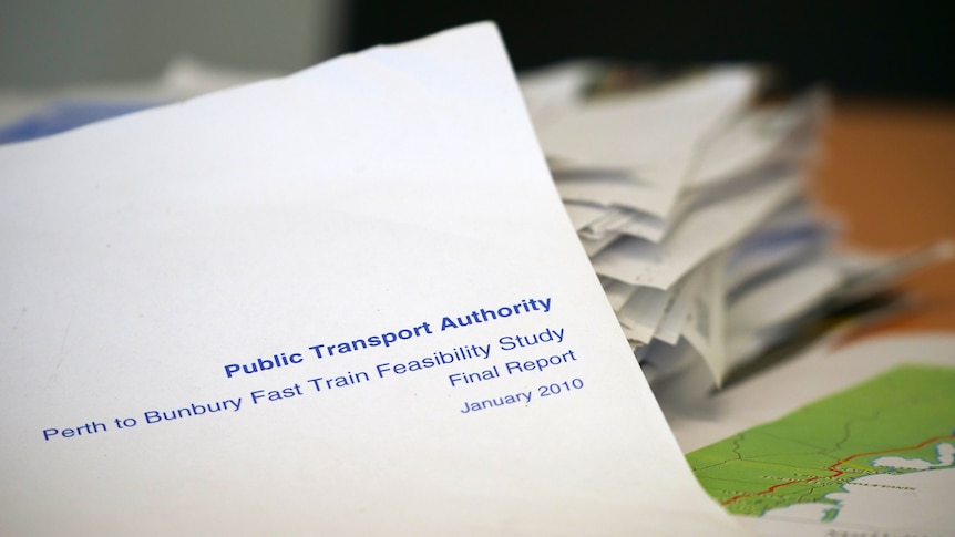 A collection of documents spread out on a table