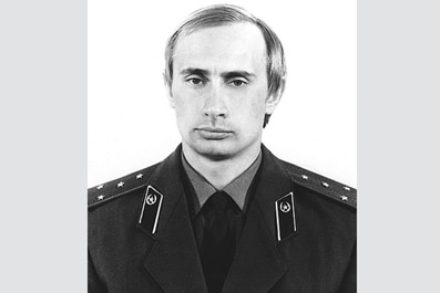 A mugshot opf Putin as a young adult. 