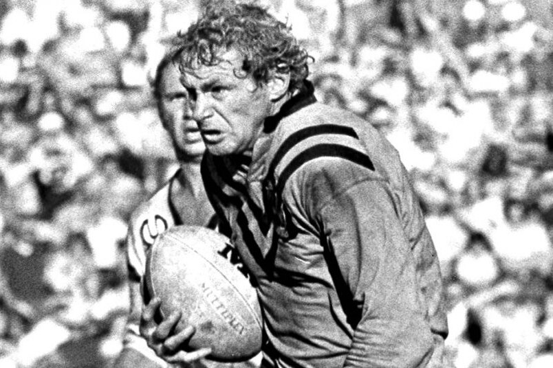 An archive photo of Dennis Tutty running with the ball for the Balmain Tigers.