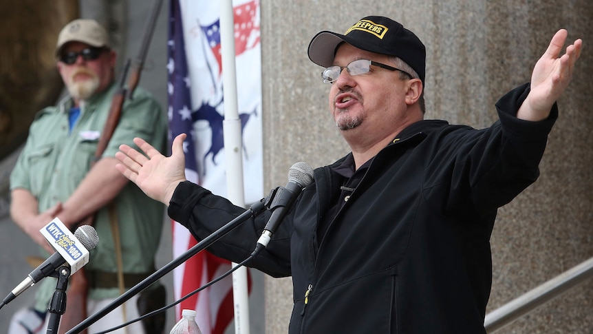 Stewart Rhodes, founder of Oath Keepers, speaks during a gun rights rally.
