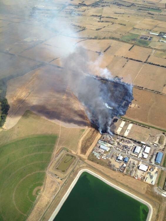 A grassfire burns near Pakenham