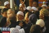 Abu Bakar Bashir was greeted by cheering supporters as he left jail.