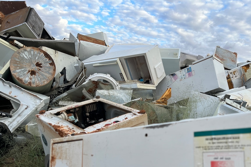 A pile of broken white good appliances at the rubbish tip in the outback Queensland town of Thargomindah.