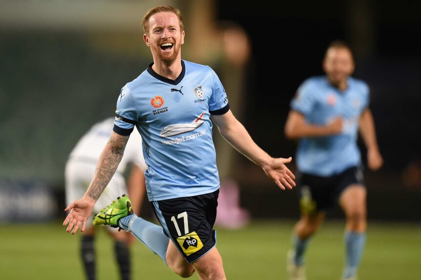 Sydney's David Carney celebrates after scoring his second goal
