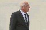 Peter Cuzner walking towards the ACT Supreme Court.