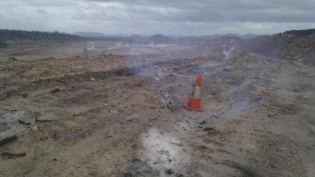 Gas rises from the ground at the Collinsville open-cut mine, north-west of Mackay, in Qld's Bowen Basin in March 2012.