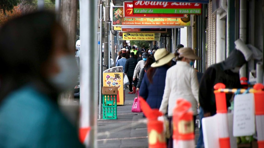 A street in Brimbank is crowded with people during the day.