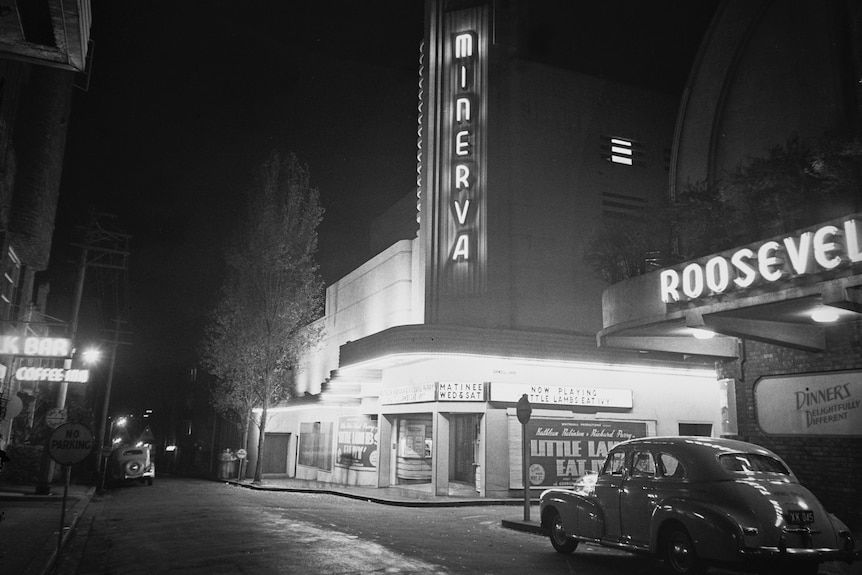 A 1940s black and white photo of a theatre with the word 'Minerva' on it, and a car from the era