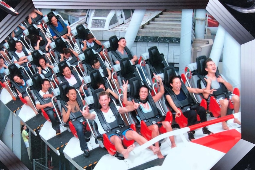 Thrill ride enthusiast Andrew Grover enjoying a roller coaster in Singapore
