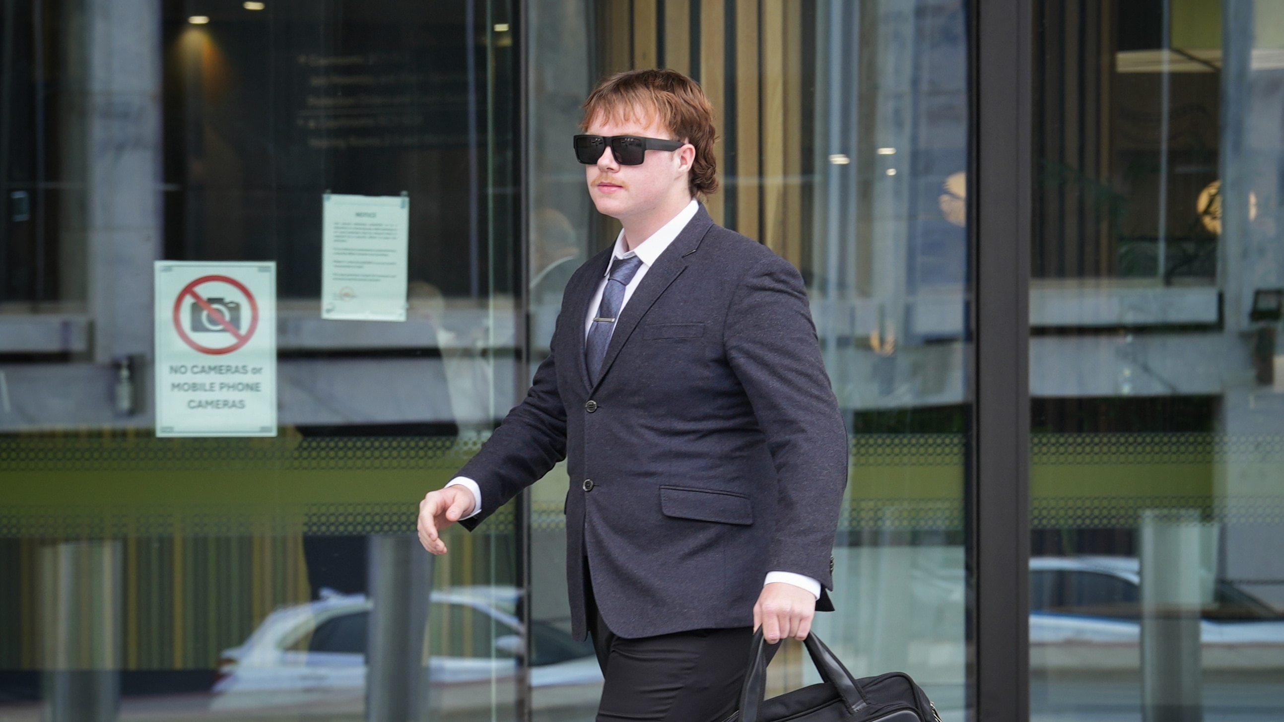 Man fined over Neo-Nazi stickers may face prison time for Nazi salute