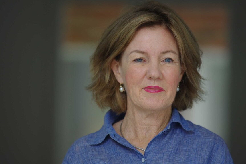 Headshot of woman looking directly at camera