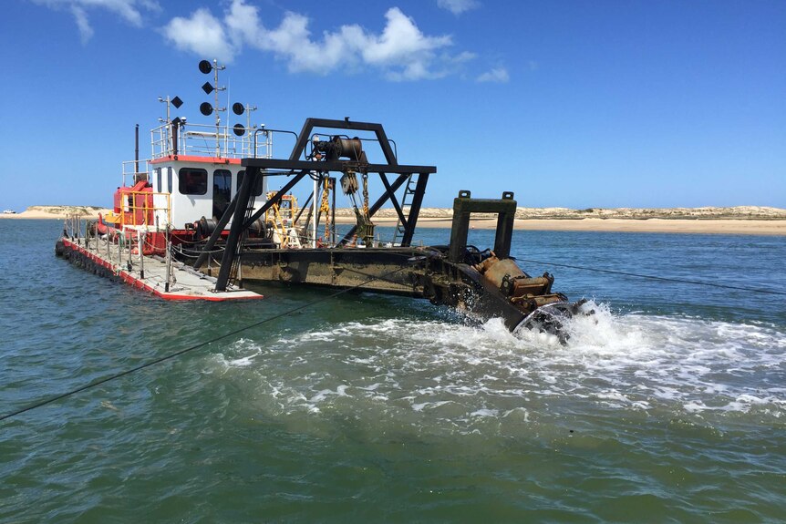 A dredge works to keep the Murray mouth clear in South Australia.