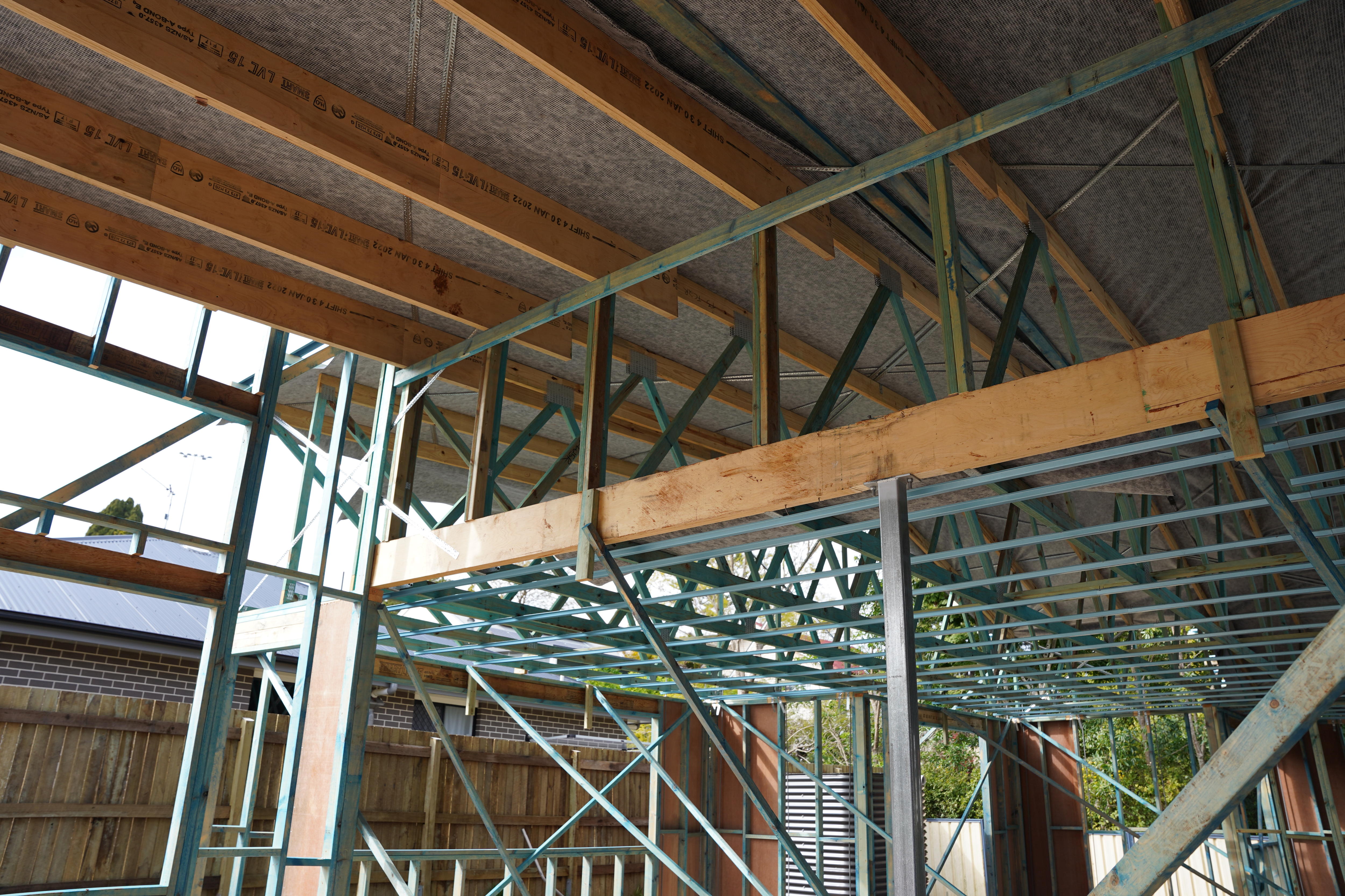 The wooden frame of a house