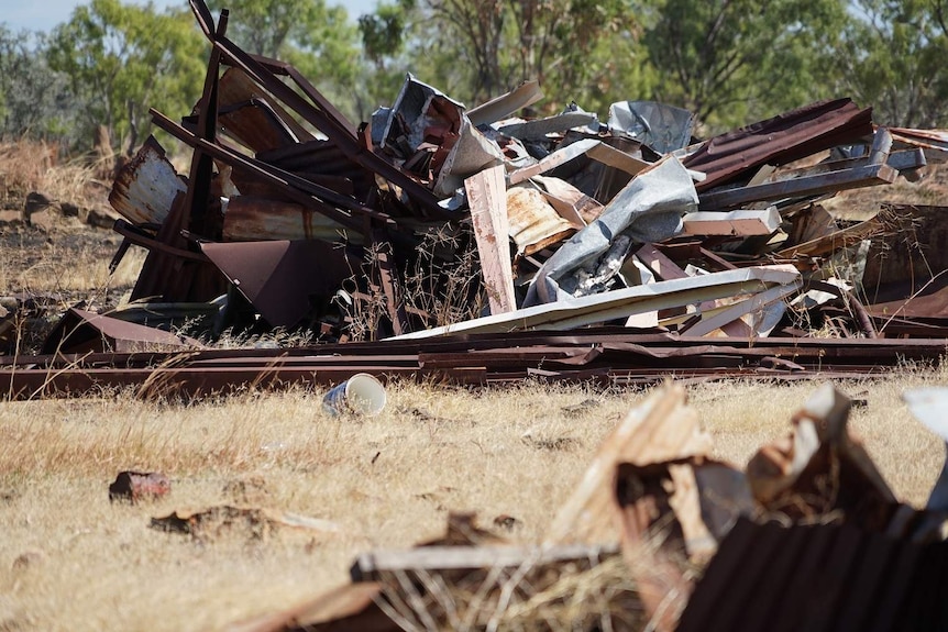 Asbestos littered among demolished housing and rubbish