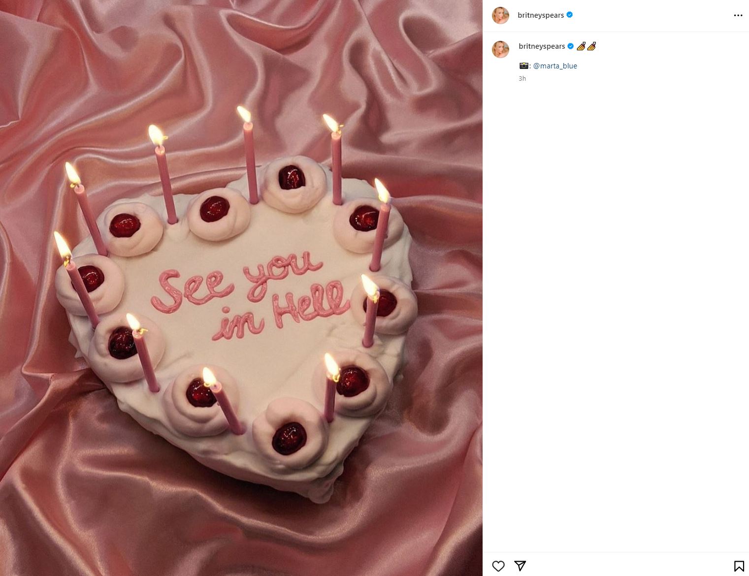 A pink heart-shaped birthday cake with the words "see you in hell" written in pink icing. 