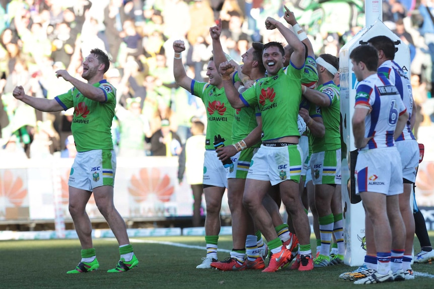 Jordan Rapana and the Raiders celebrate their game-winning try in Canberra