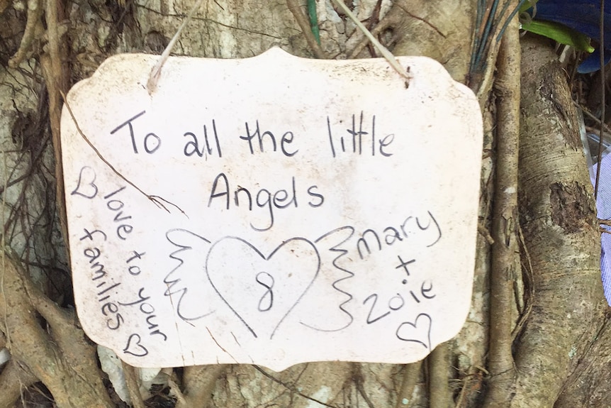 Tribute message at memorial park at the site where eight children were murdered in 2014 at a house at Manoora in Cairns