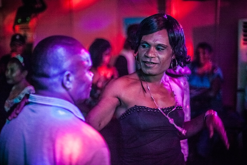 Papua New Guinean gay man dances at nightclub