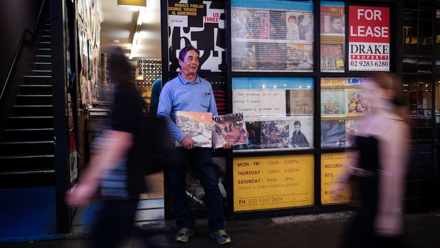 Jerry Pasqual out the front of his store, Lawson's Records.