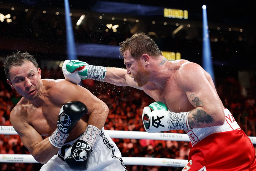Golovkin ducks away from a punch thrown by Canelo