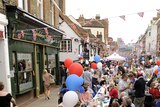 Revellers at a street party in Eton high street