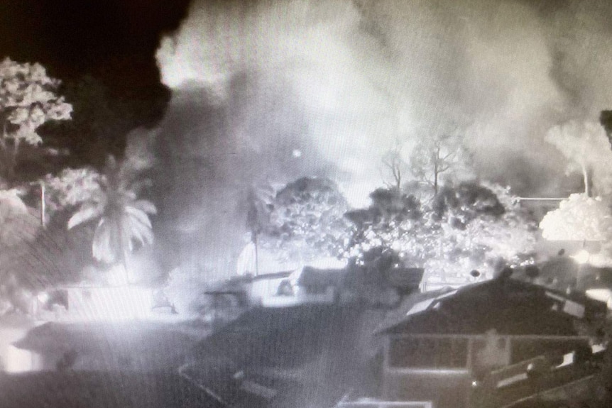 CCTV still of a home on fire at night in Aurukun community in Far North Queensland on January 1, 2019
