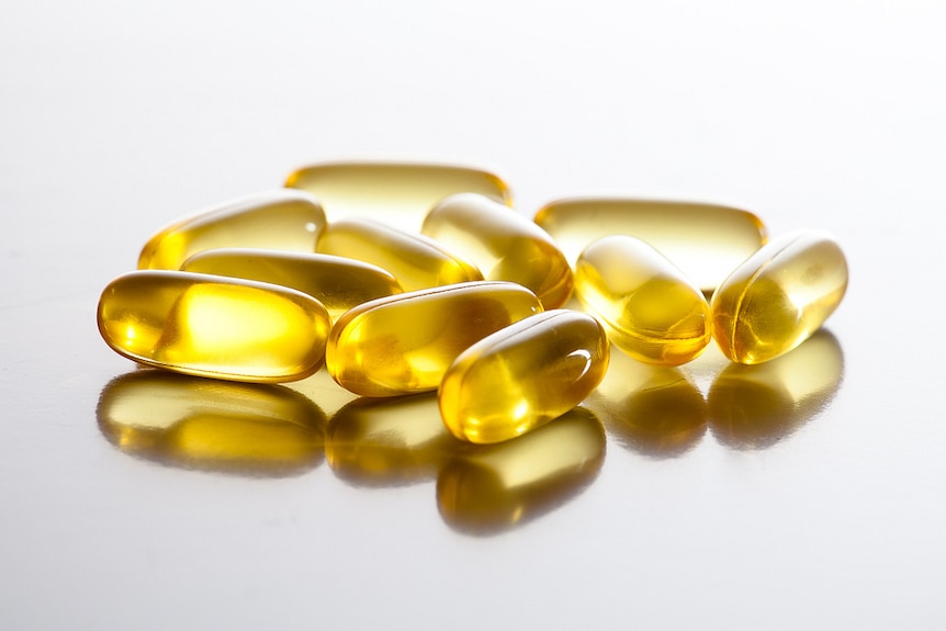 Fish oil capsules on a table