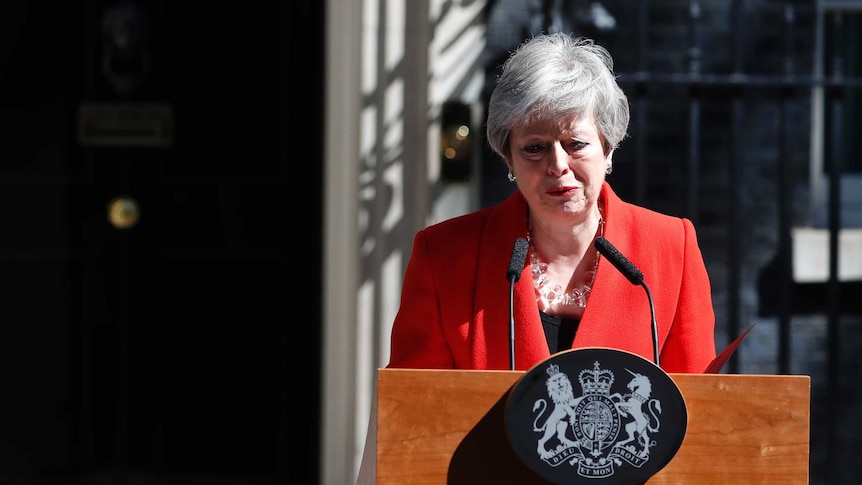 British Prime Minister Theresa May weeps as she stands in front of Number 10 and announces her resignation