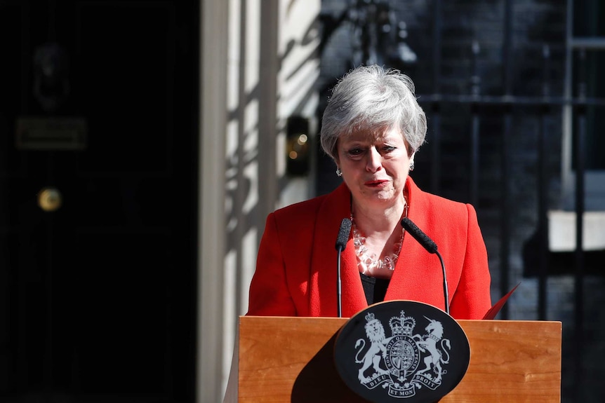 British Prime Minister Theresa May weeps as she stands in front of Number 10 and announces her resignation