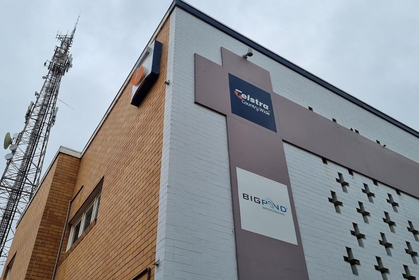 A brick building with with a Telstra logo