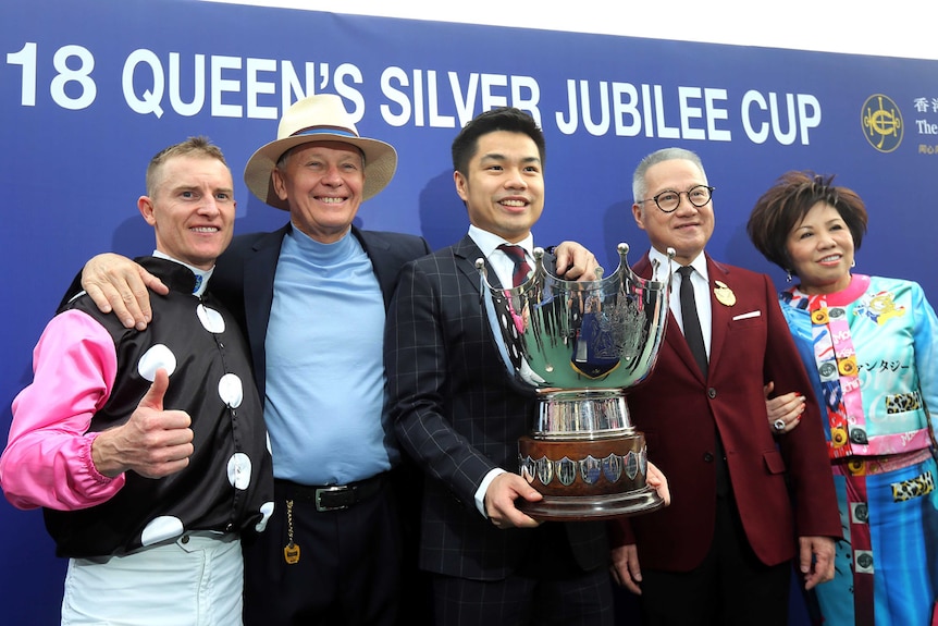 Zac Purton (left), John Moore (second from left), Patrick Kwok (centre), Simon Kwok (second from right) and Eleanor Kwok (right)