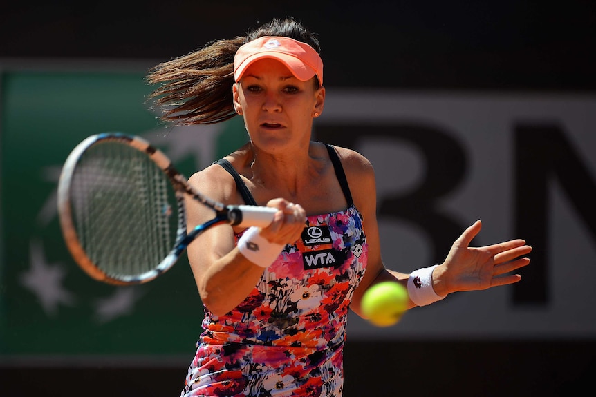 Agniezska Radwanska plays a shot at French Open