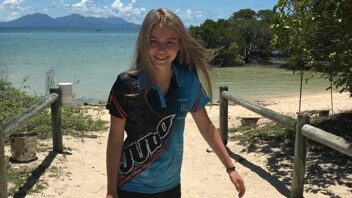 A photo of far north Queensland teen Bonita standing on a beach