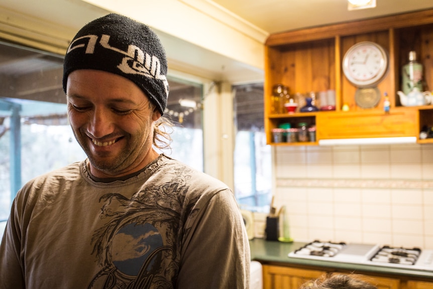 A close-up of Ruben's face smiling.