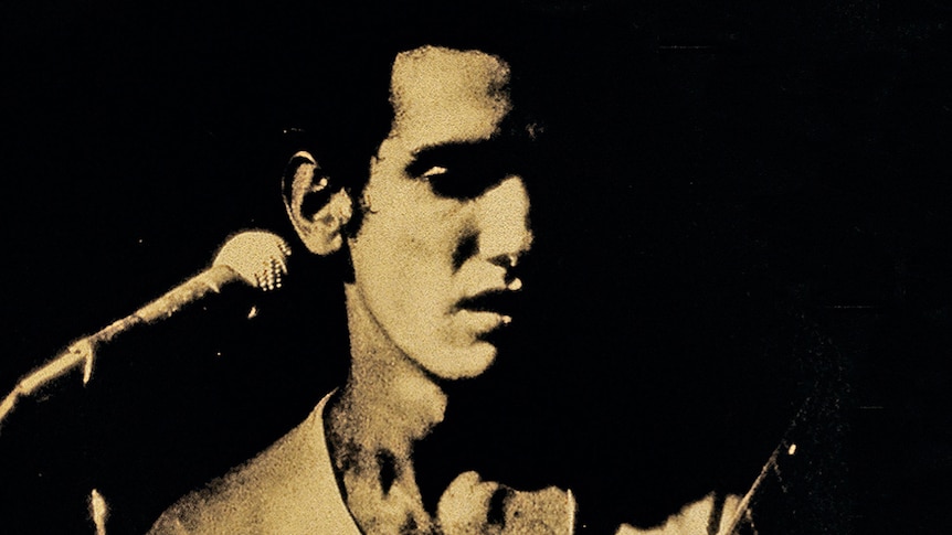 Sepia photo of Paul Kelly from the cover of the Gossip album
