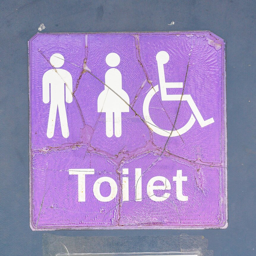 Sign to public toilets, male, female and accessible toilets.